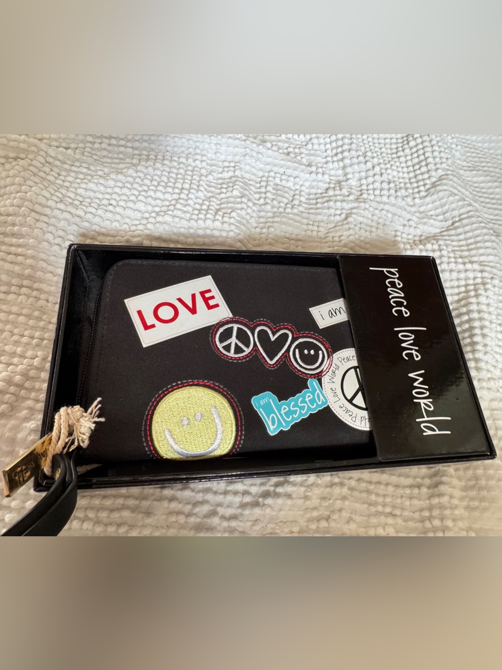 Peace Love World Black Wristlet with Colorful Patch Accents